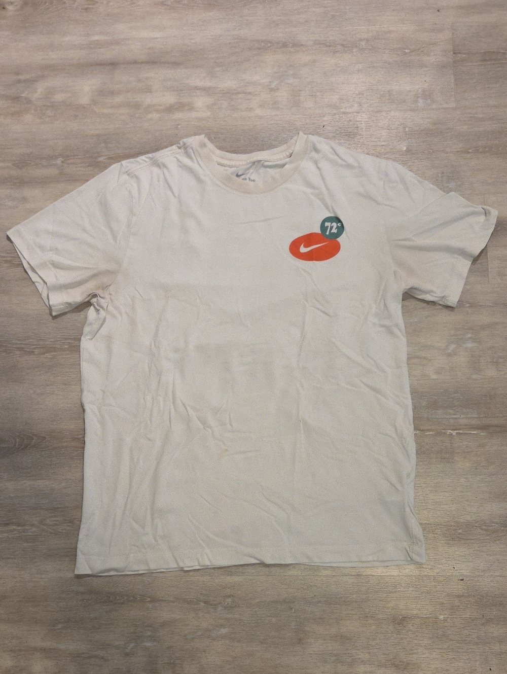 Nike White Short Sleeve Tee with Orange Swoosh and Teal Badge